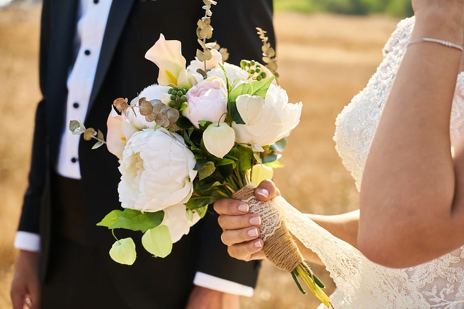 bride and groom with bouquet