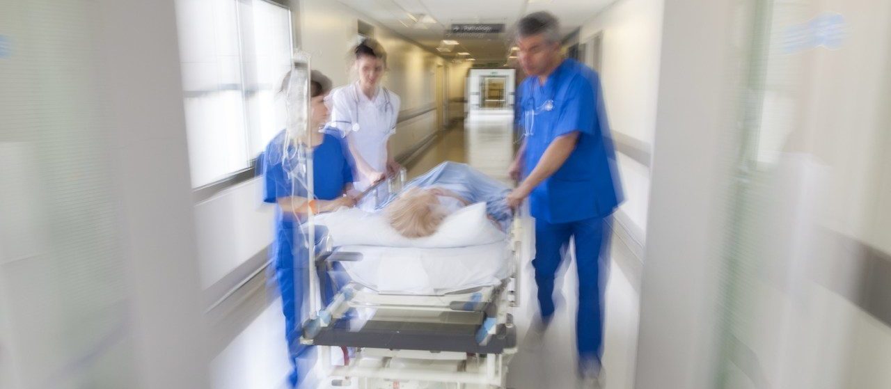 patient being rushed through hospital