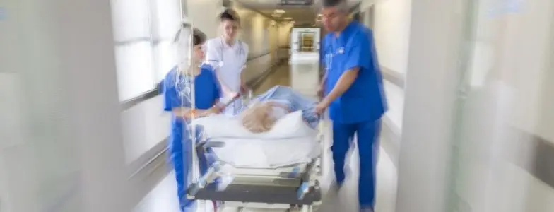 patient being rushed through hospital