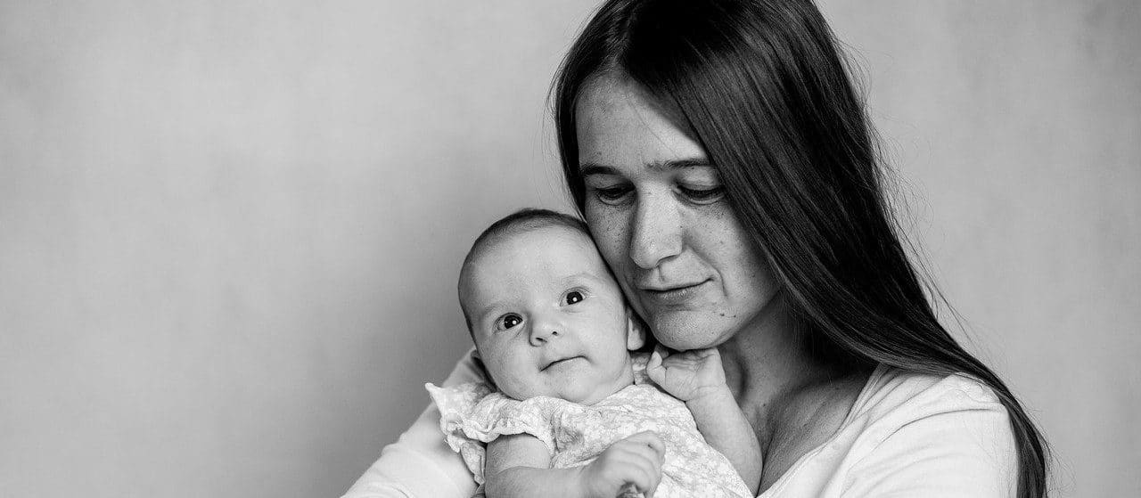 black and white picture mom with baby