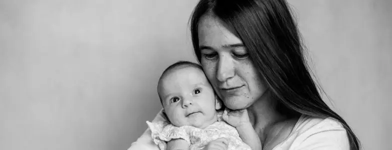 black and white picture mom with baby