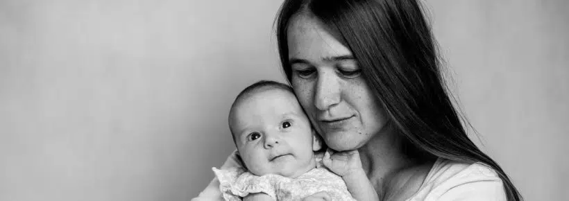 black and white picture mom with baby