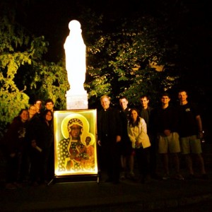 Fr. West with Villanova students.