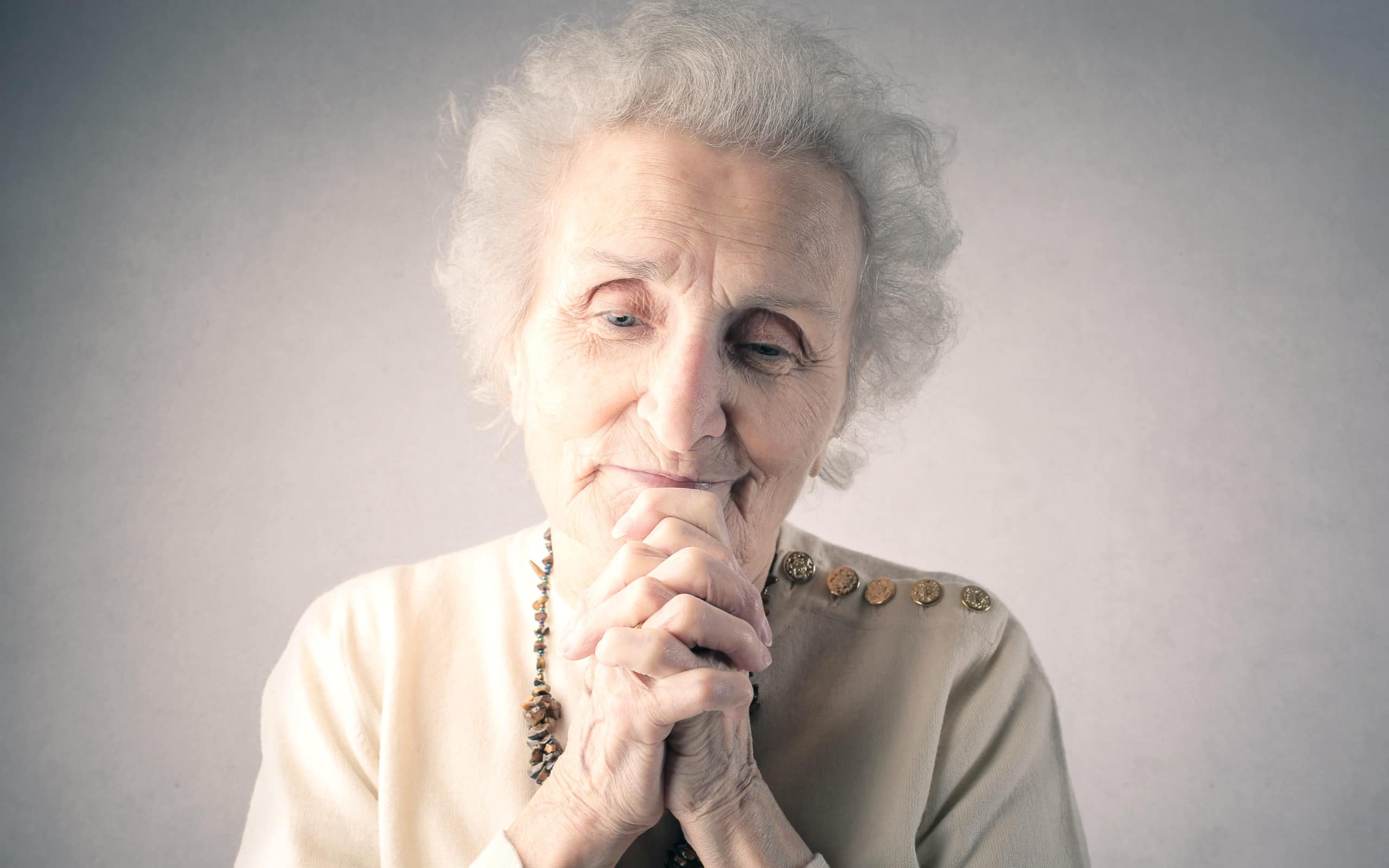 elderly woman at peace