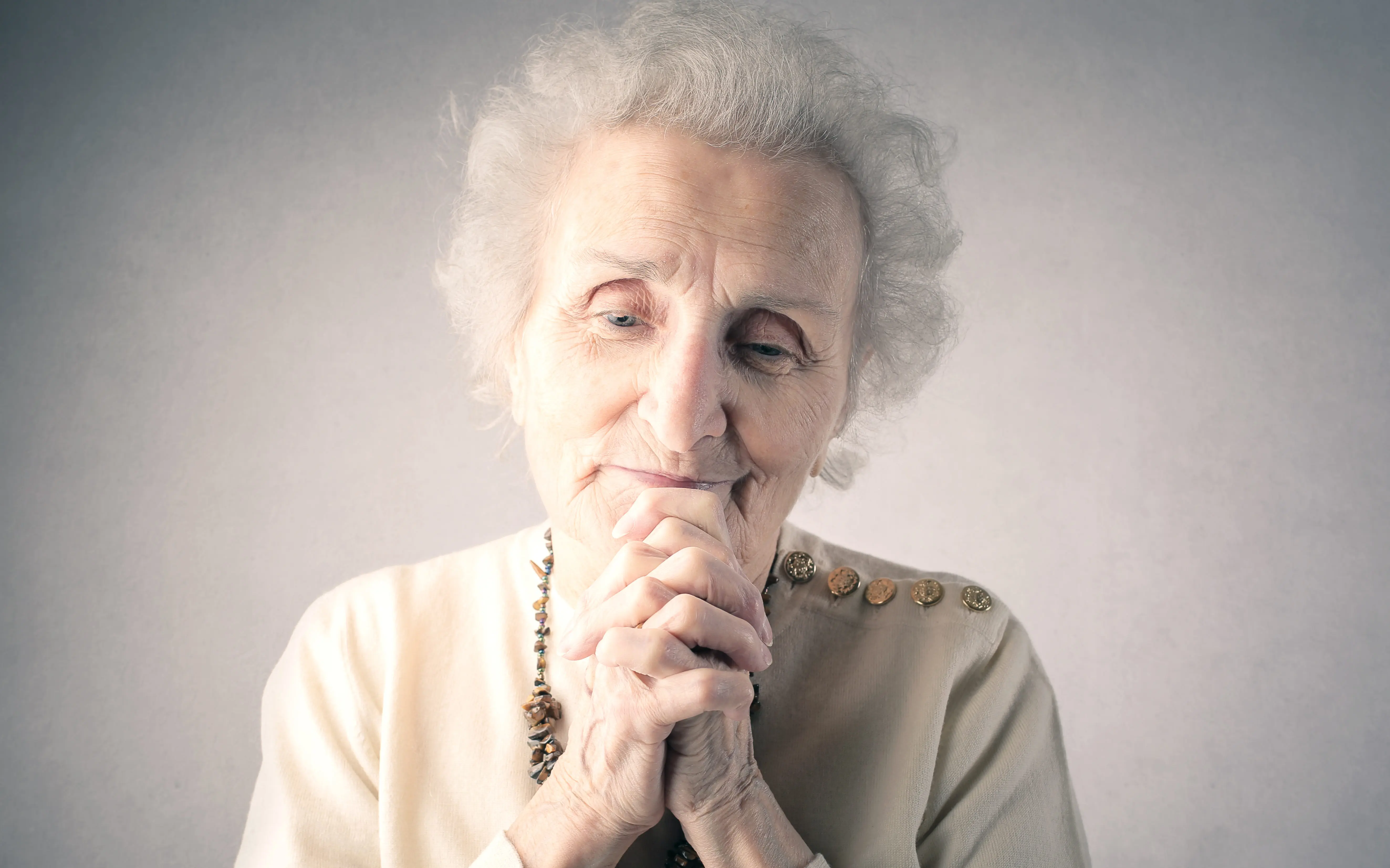 elderly woman at peace