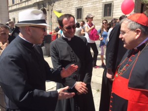 HLI President Fr. Shenan J. Boquet, Fr. Francesco Giordano, and Cardinal Raymond Burke exchange greetings at Rome's 5th March for Life. May 2015