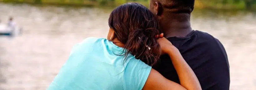 man and woman by water