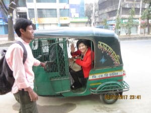On board the CNG, a common mode of transport in Bangladesh, Dhaka