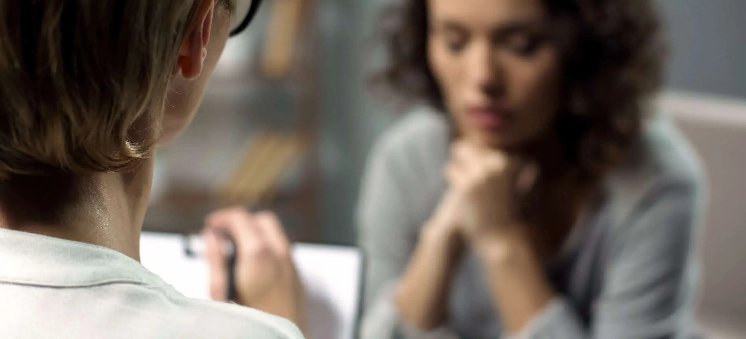 young woman talking to therapist