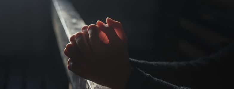 hands folded in prayer