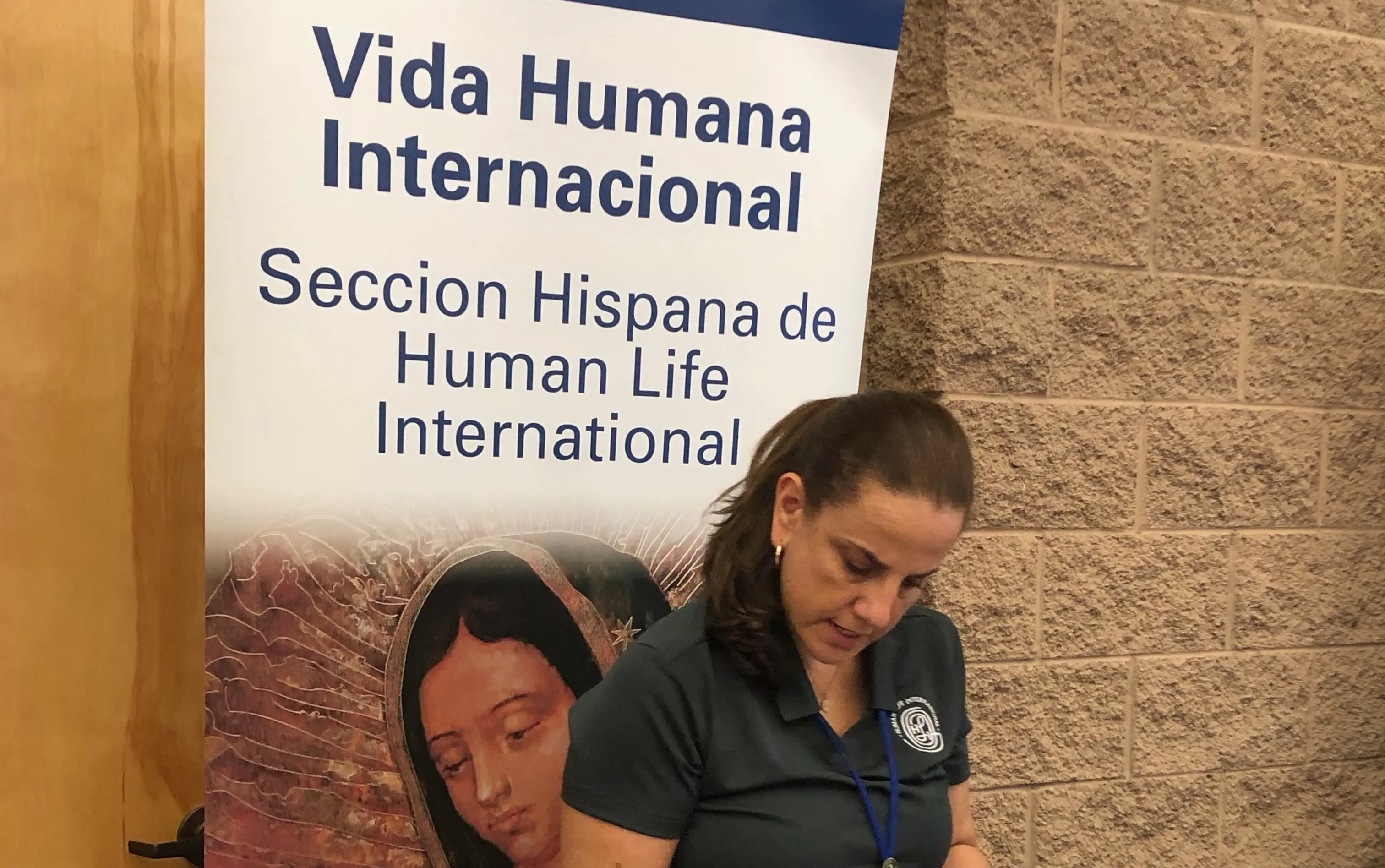 HLI Miami's Adriana Thurdekoos mans the HLI resources table