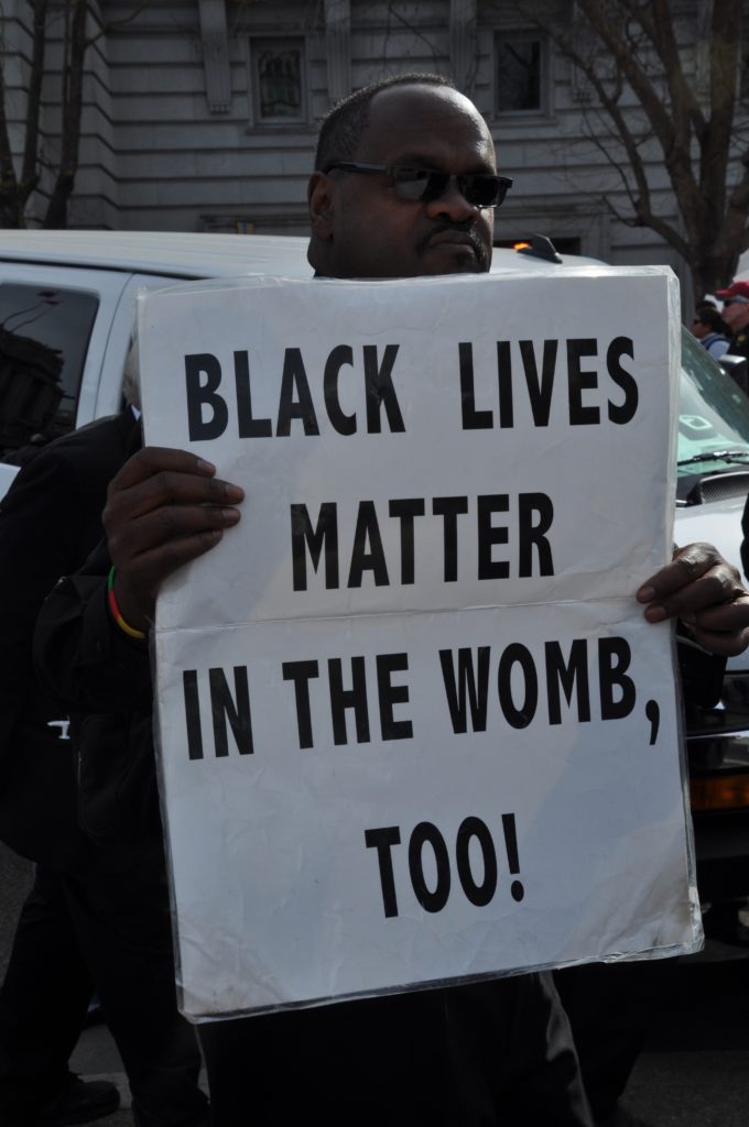 black lives matter in the womb sign - san francisco walk for life 2019
