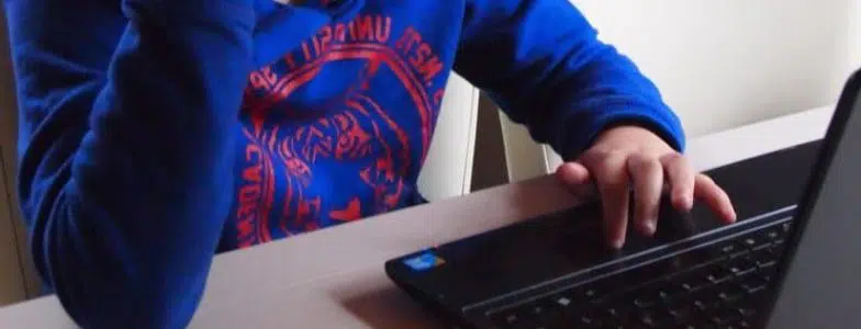 boy on laptop computer