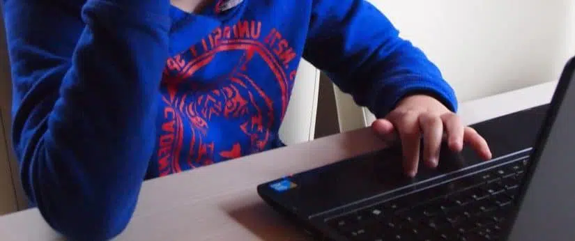 boy on laptop computer
