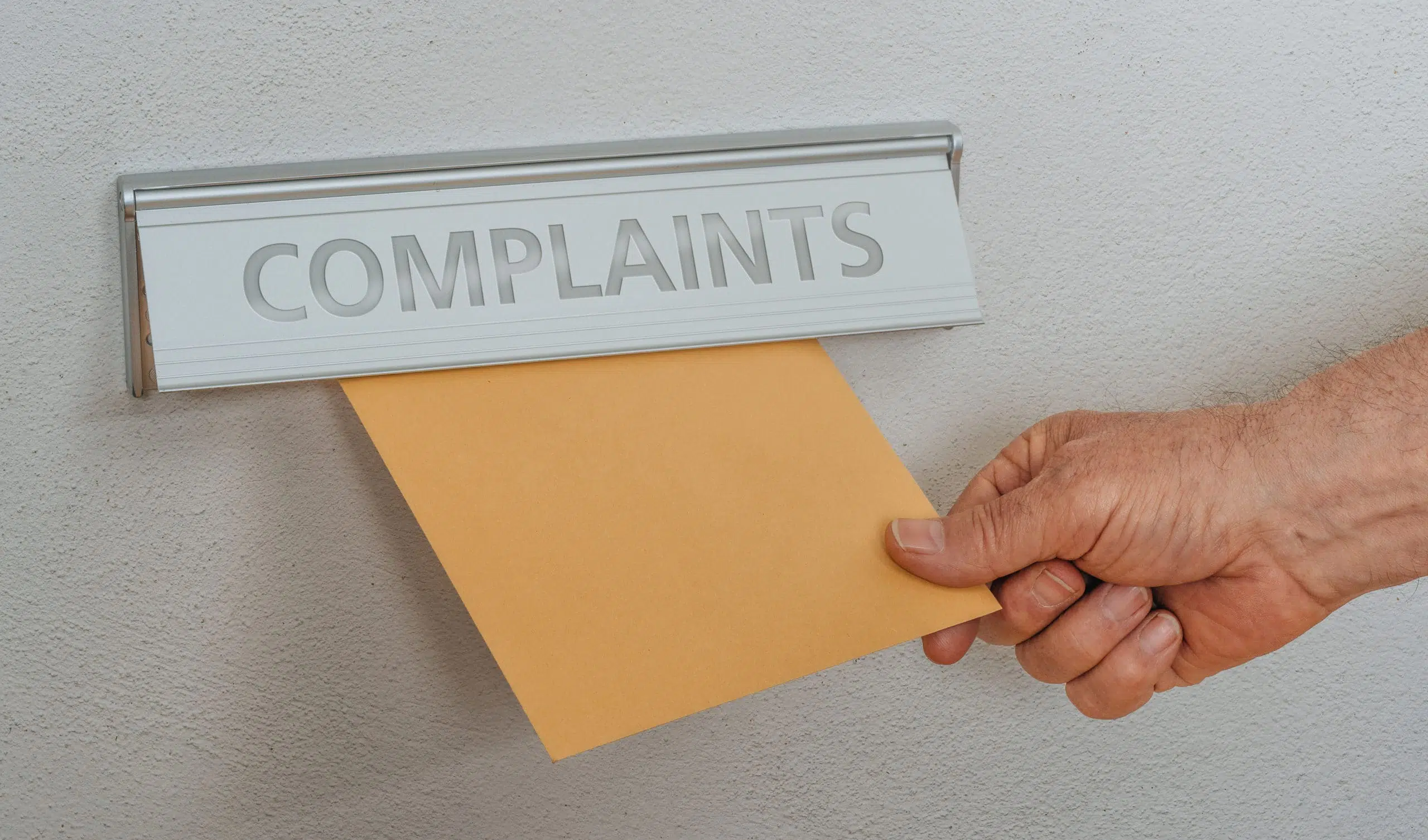 A letterbox with the inscription Complaints, letter of complaint