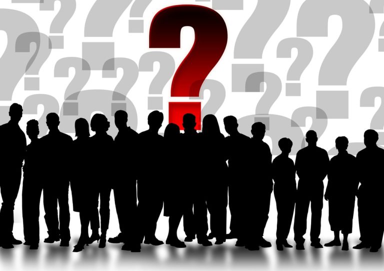 silhouettes crowd of people with question marks