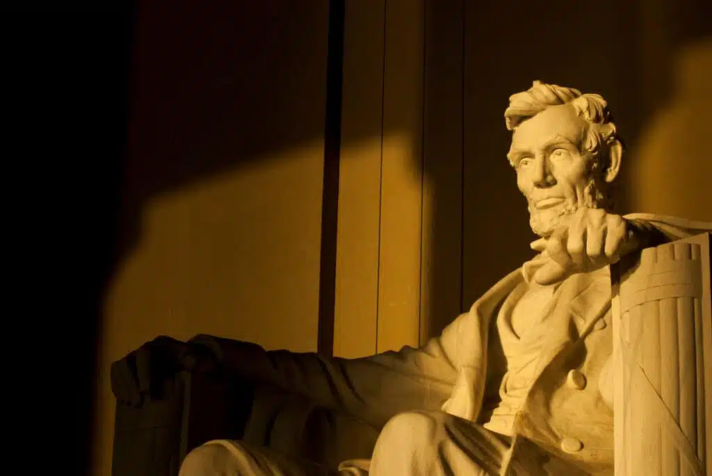 Statue of Abraham Lincoln in brilliant warm dramatic morning sun