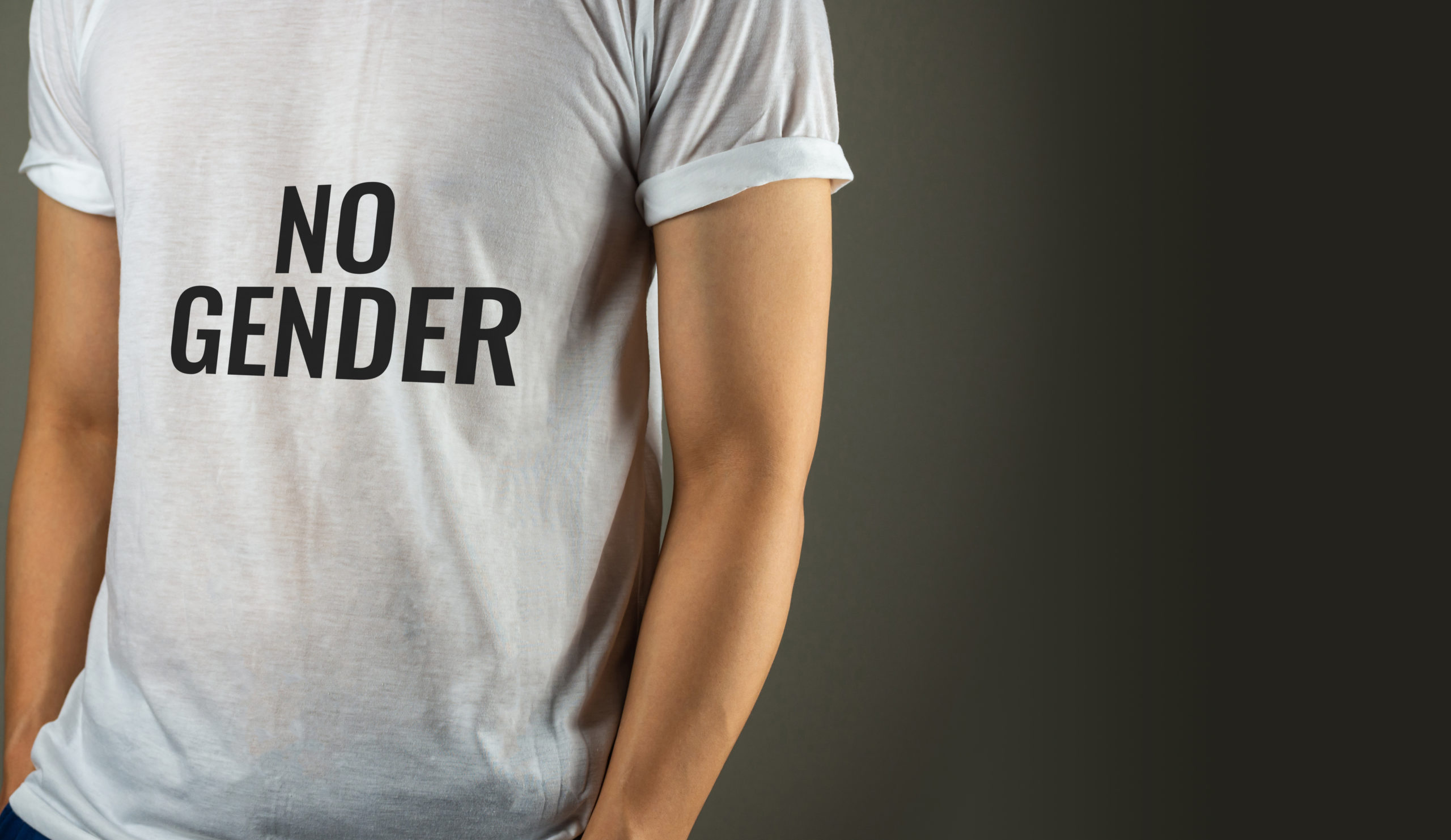 No Gender text on t-shirt on grey background