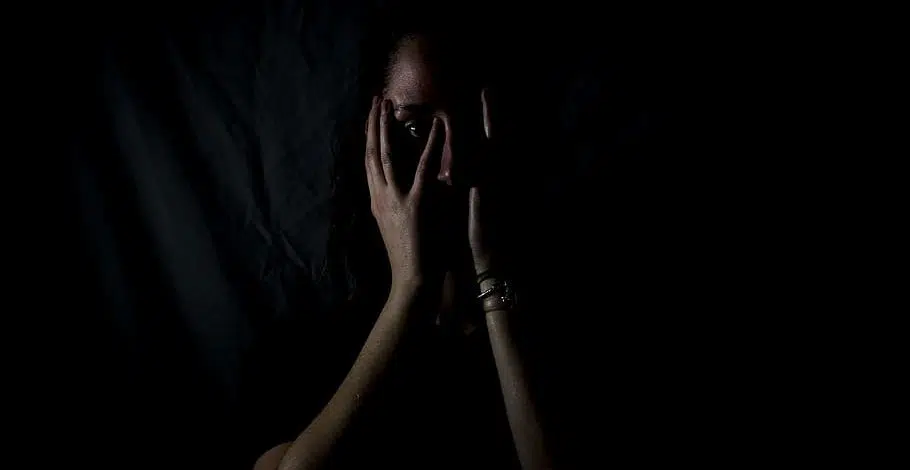 despairing woman dark