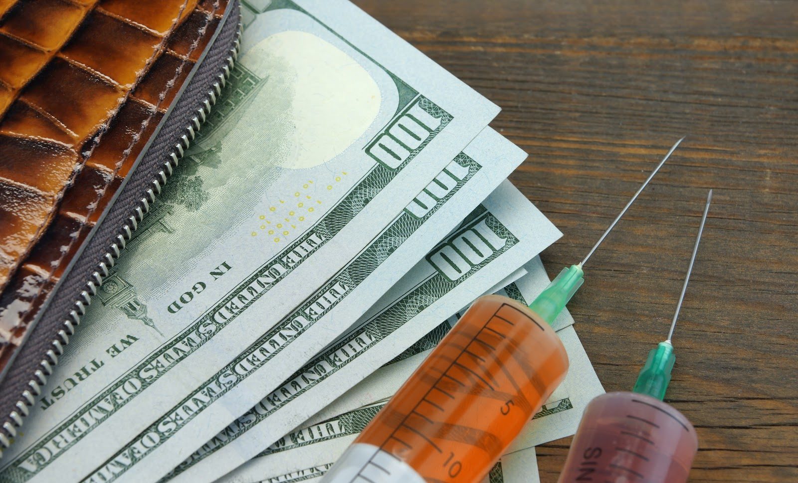 Wallet With US Dollar Cash And Two Syringe purpose of suffering