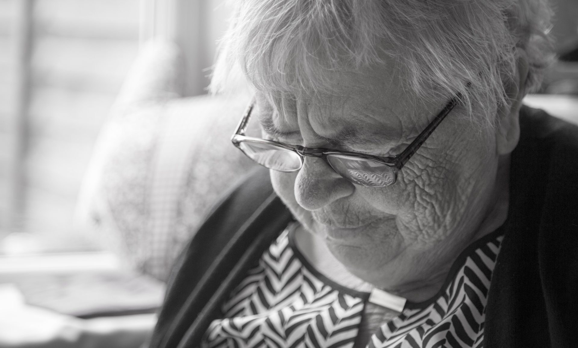 sad old woman black and white