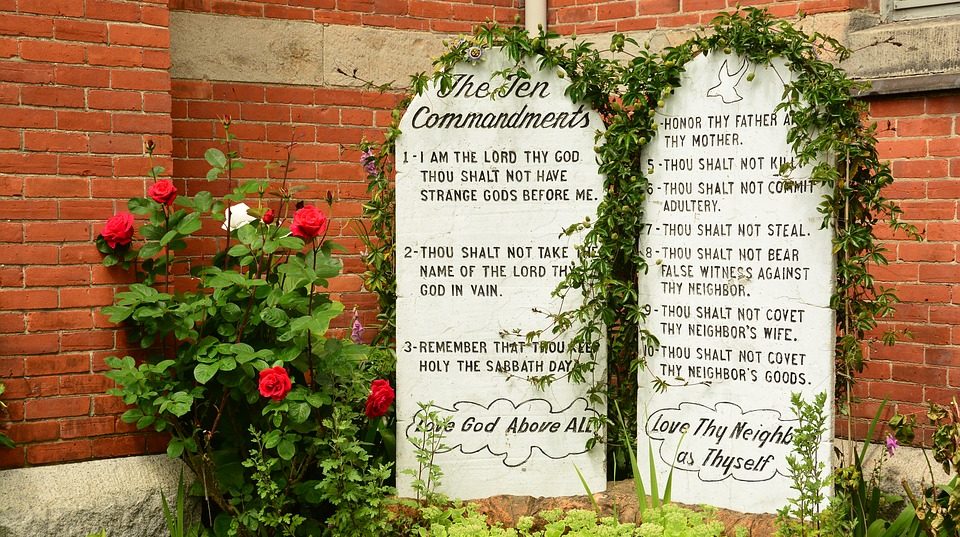 ten commandments stone tablets with rosebush
