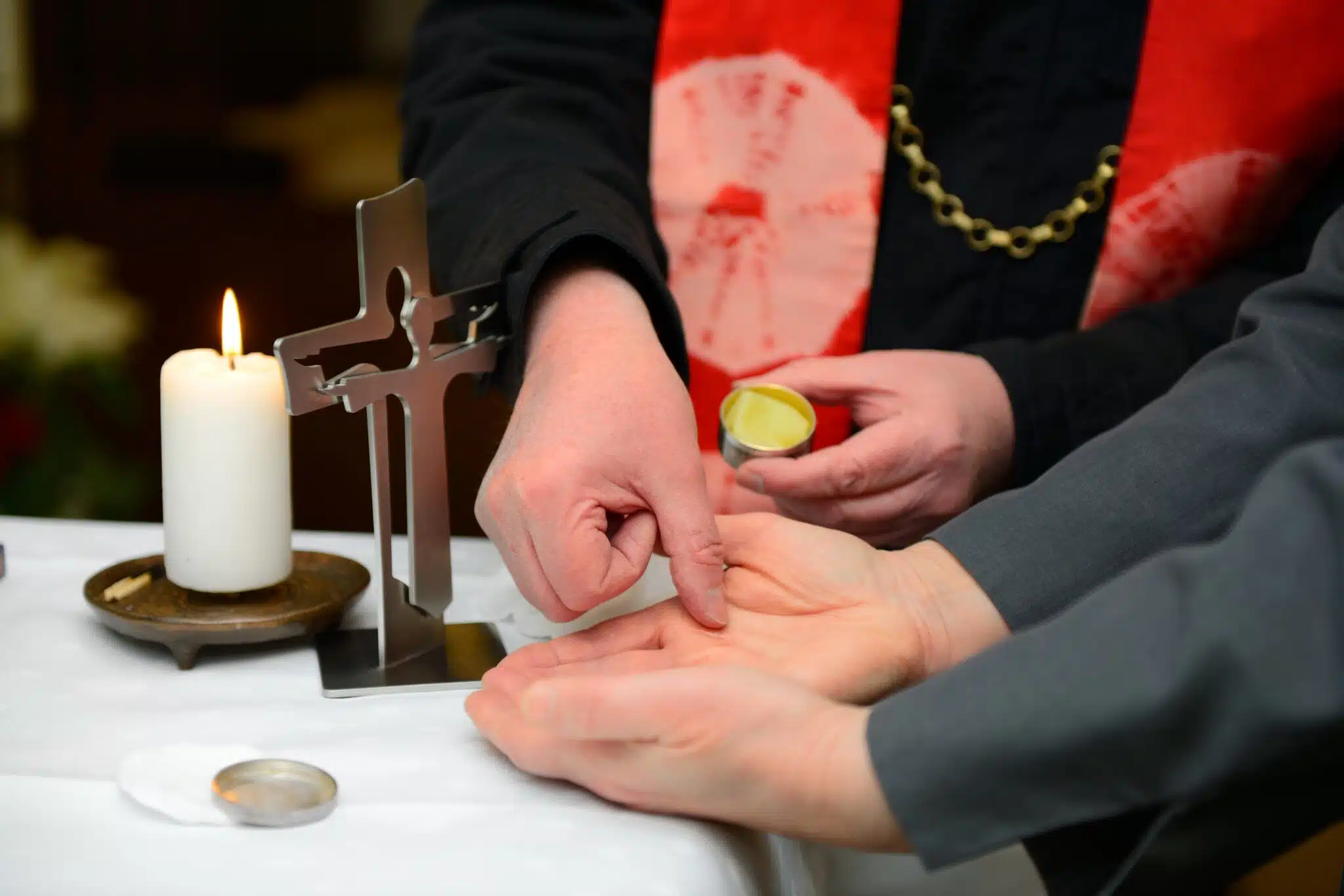 Priest performing Anointing of the Sick (Extreme Unction)