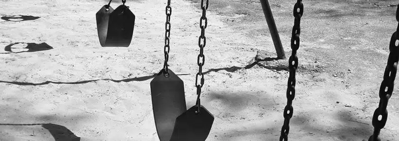 Empty swings representing antinatalism