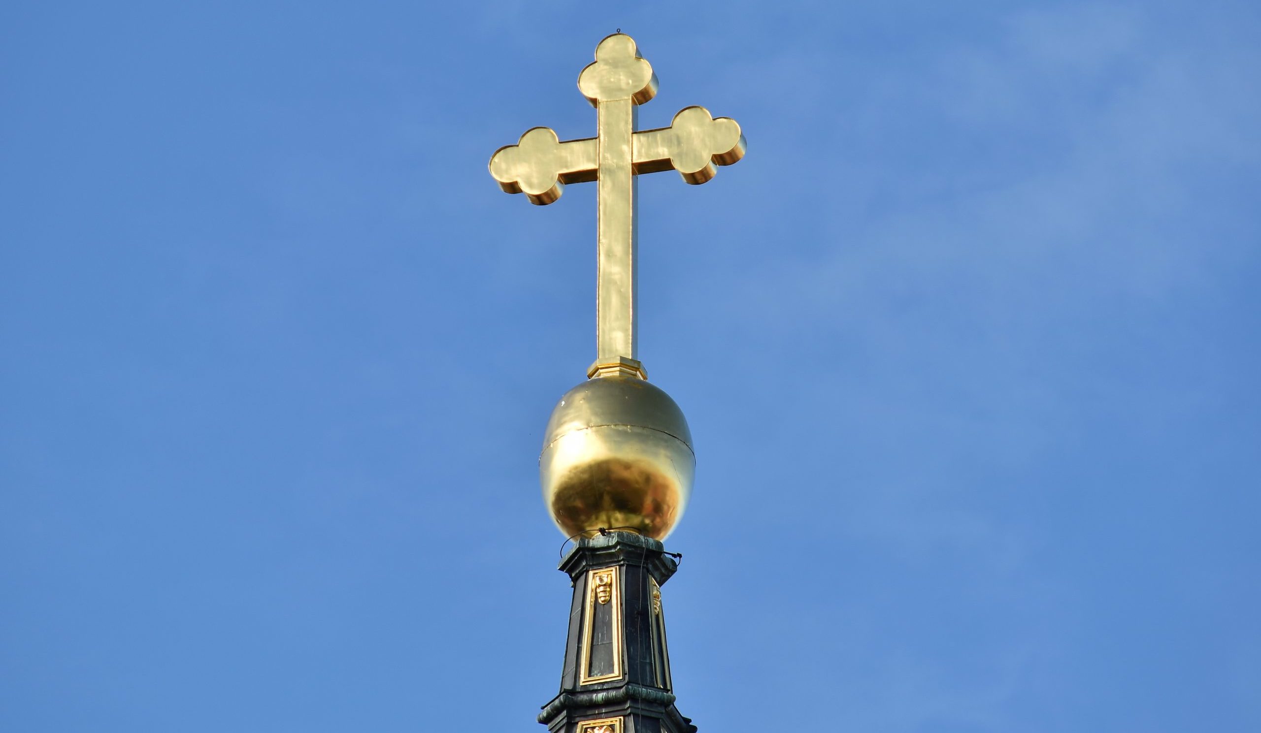 gold cross on top of church, christianity on abortion