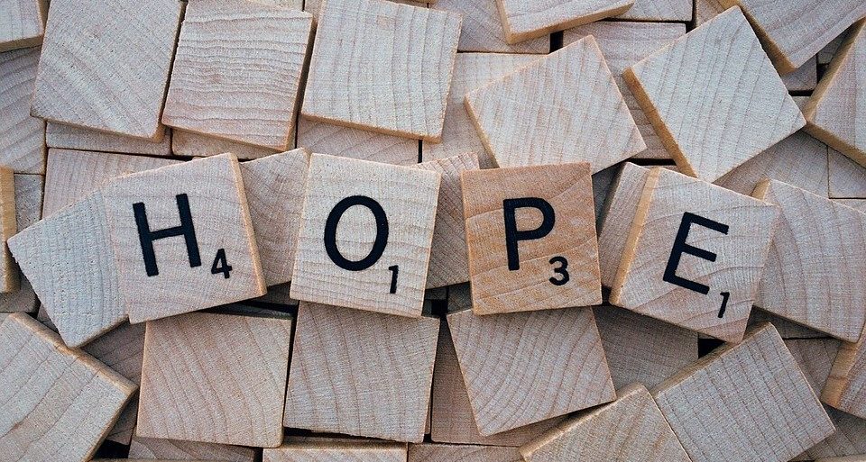 the word hope spelled with scrabble letters
