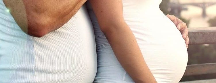man and pregnant woman