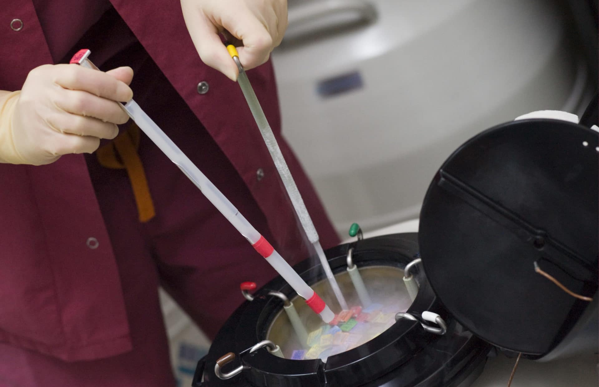 Embryologist freezing embryos for storage