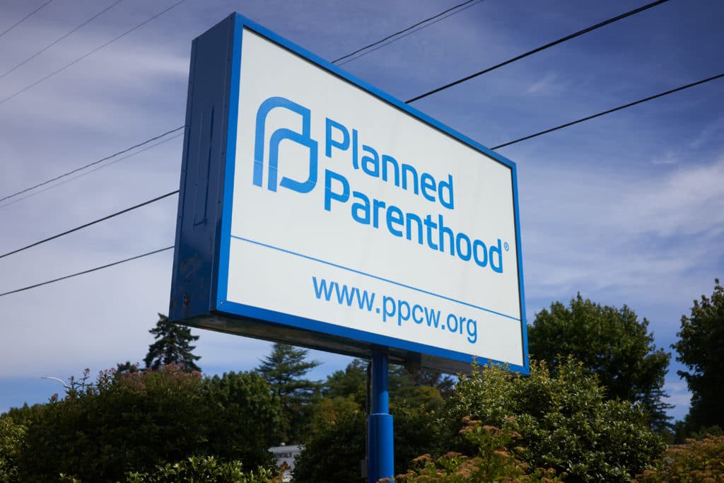 Milwaukie, OR, USA - Planned Parenthood sign - who pays for abortions at planned parenthood