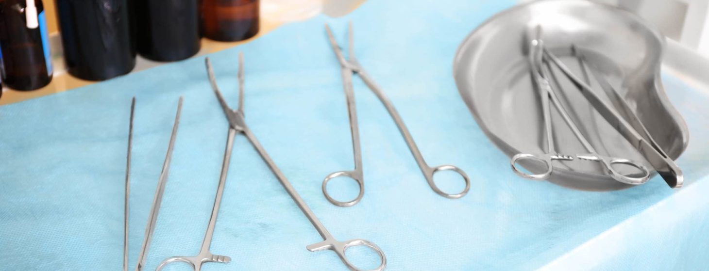 Gynecological tools on doctor's table in clinic