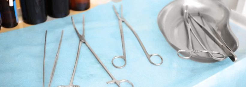 Gynecological tools on doctor's table in clinic