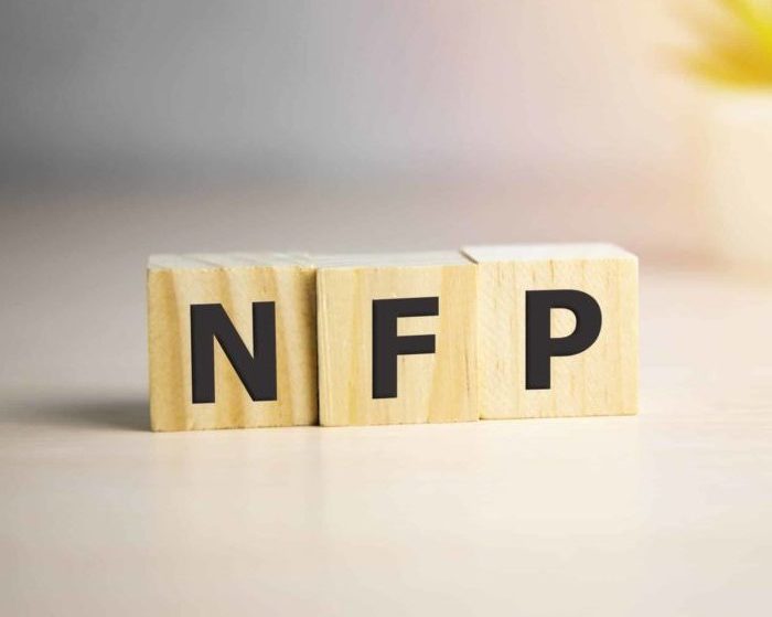 NFP - acronym from wooden blocks with letters, abbreviation NFP, Natural Family Planning concept