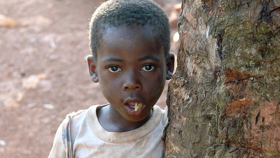little ugandan boy dirty and poor