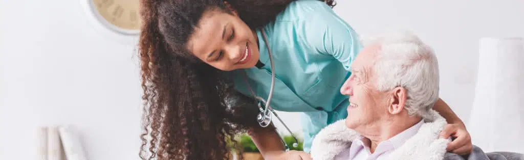 young nurse caring for an elderly man