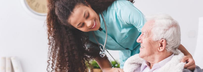 young nurse caring for an elderly man