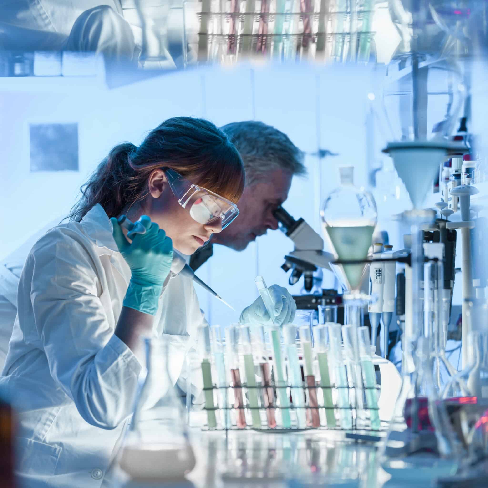 Health care researchers working in scientific laboratory.