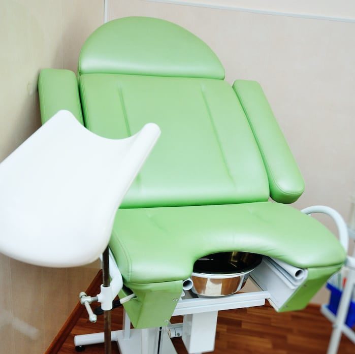 green gynecological chair