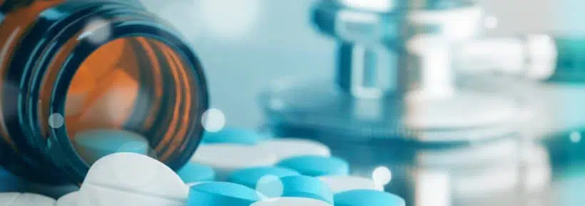 spilling bottle of pills