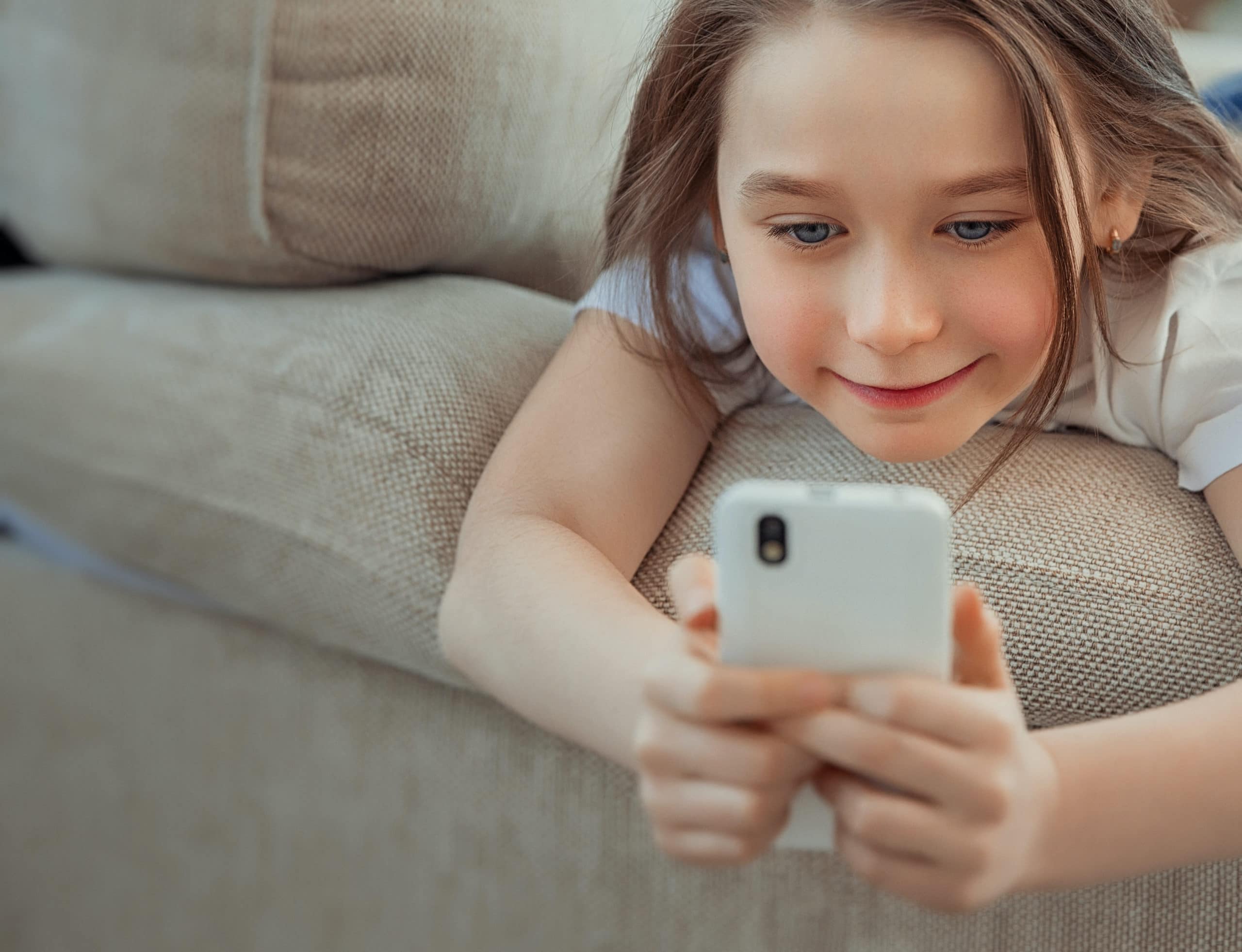 little girl using a phone