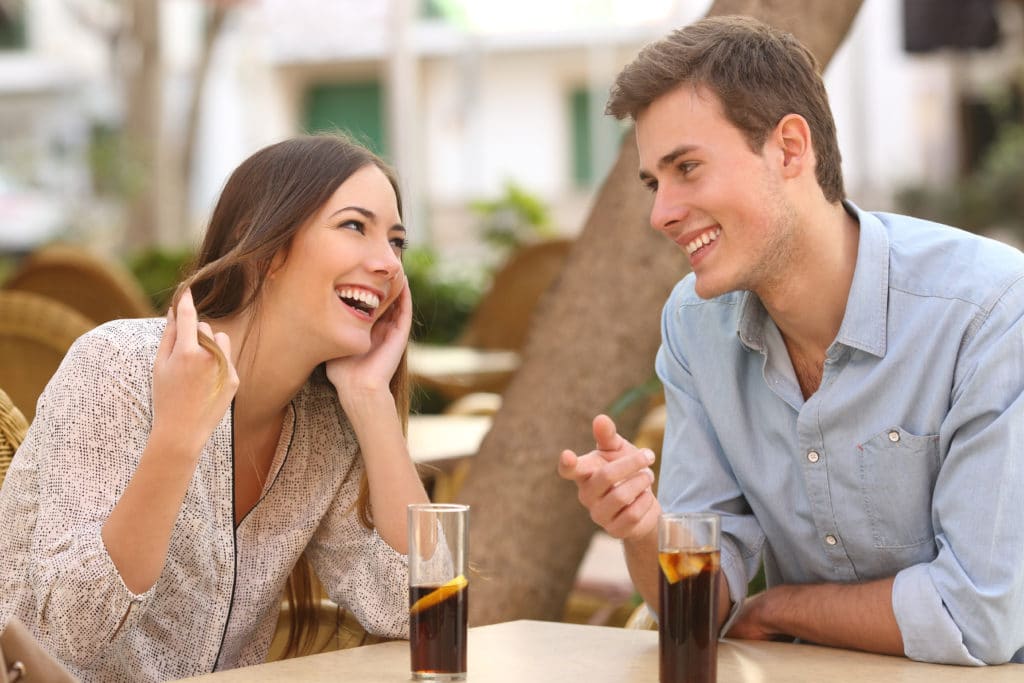 young couple having drinks on a date