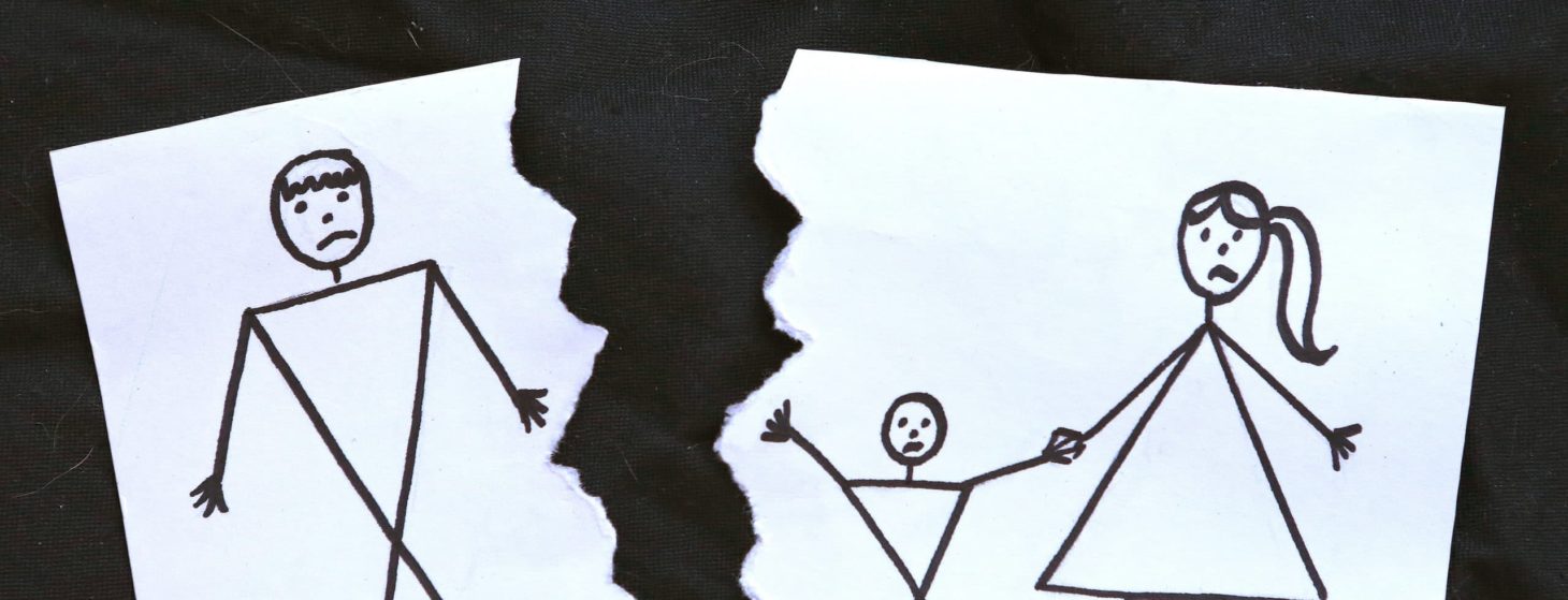 Fatherhood: Stick figure family with father torn off