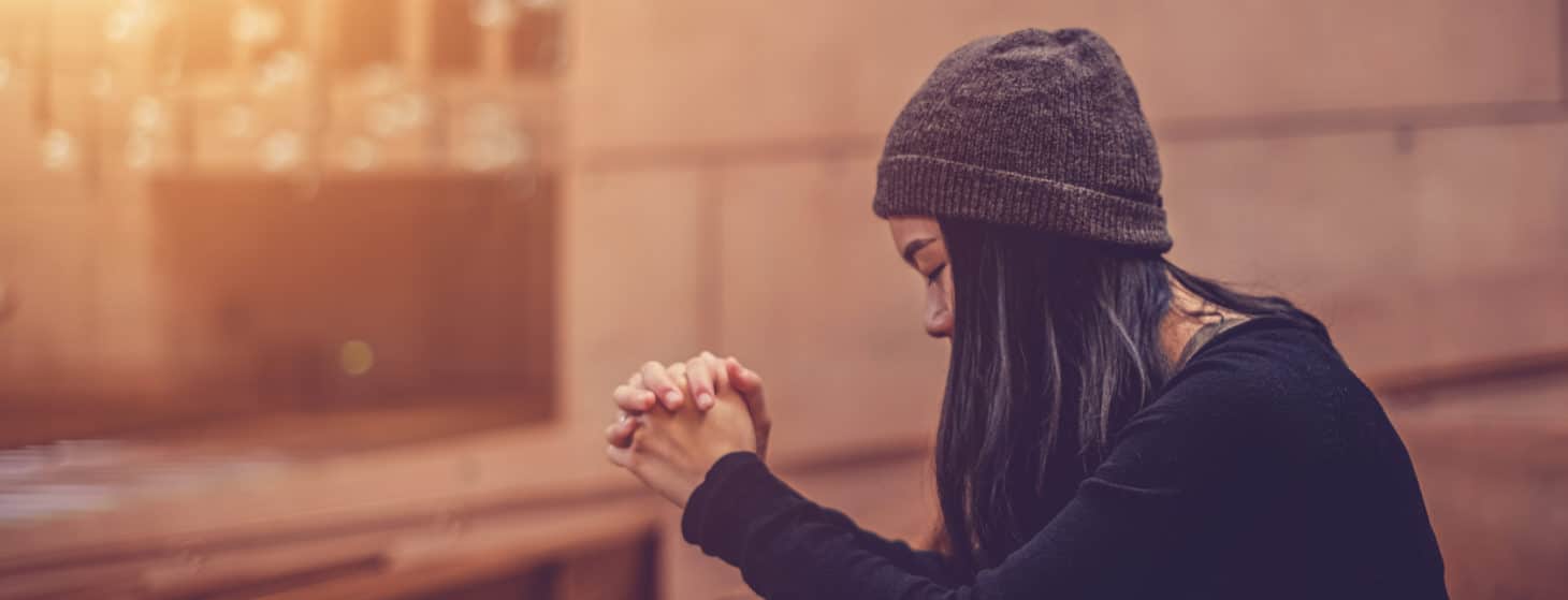 woman praying in church