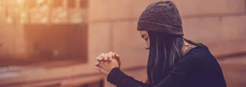 woman praying in church
