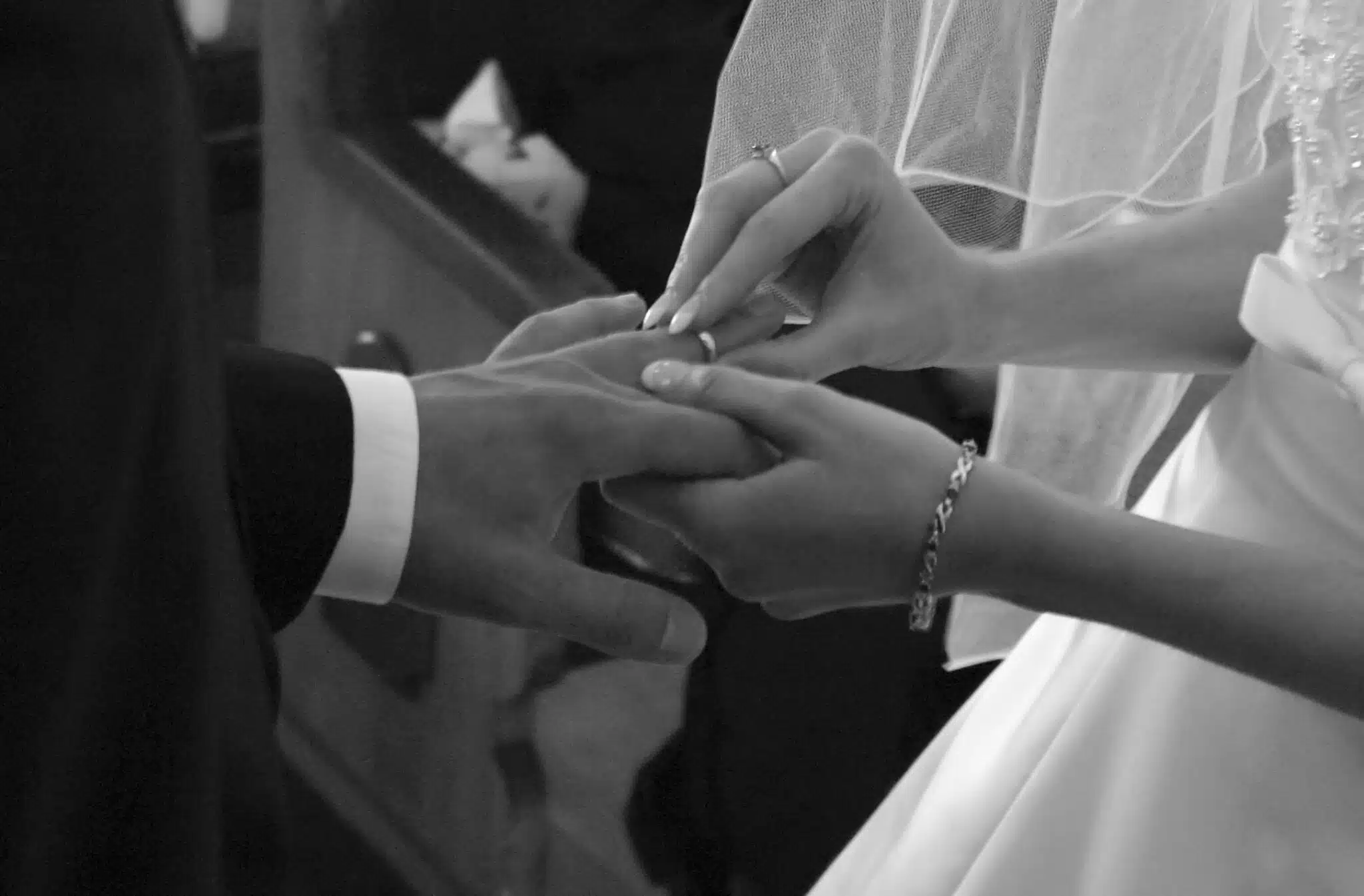 the exchange of wedding rings during a marriage ceremony 