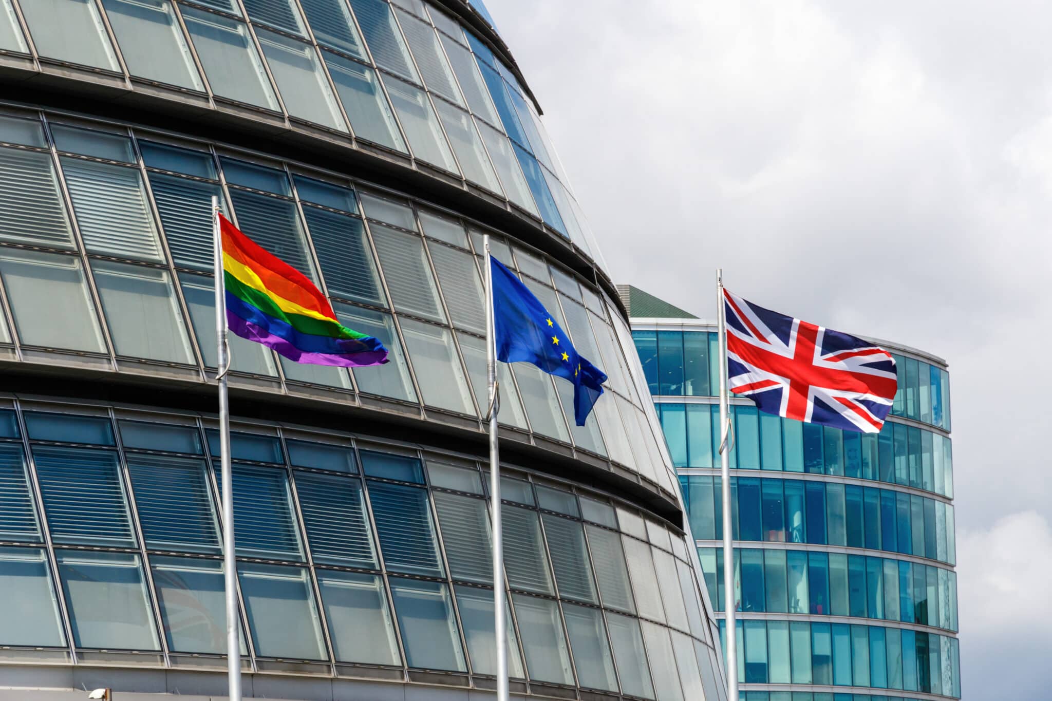 pride flag, eu flag and union jack flag