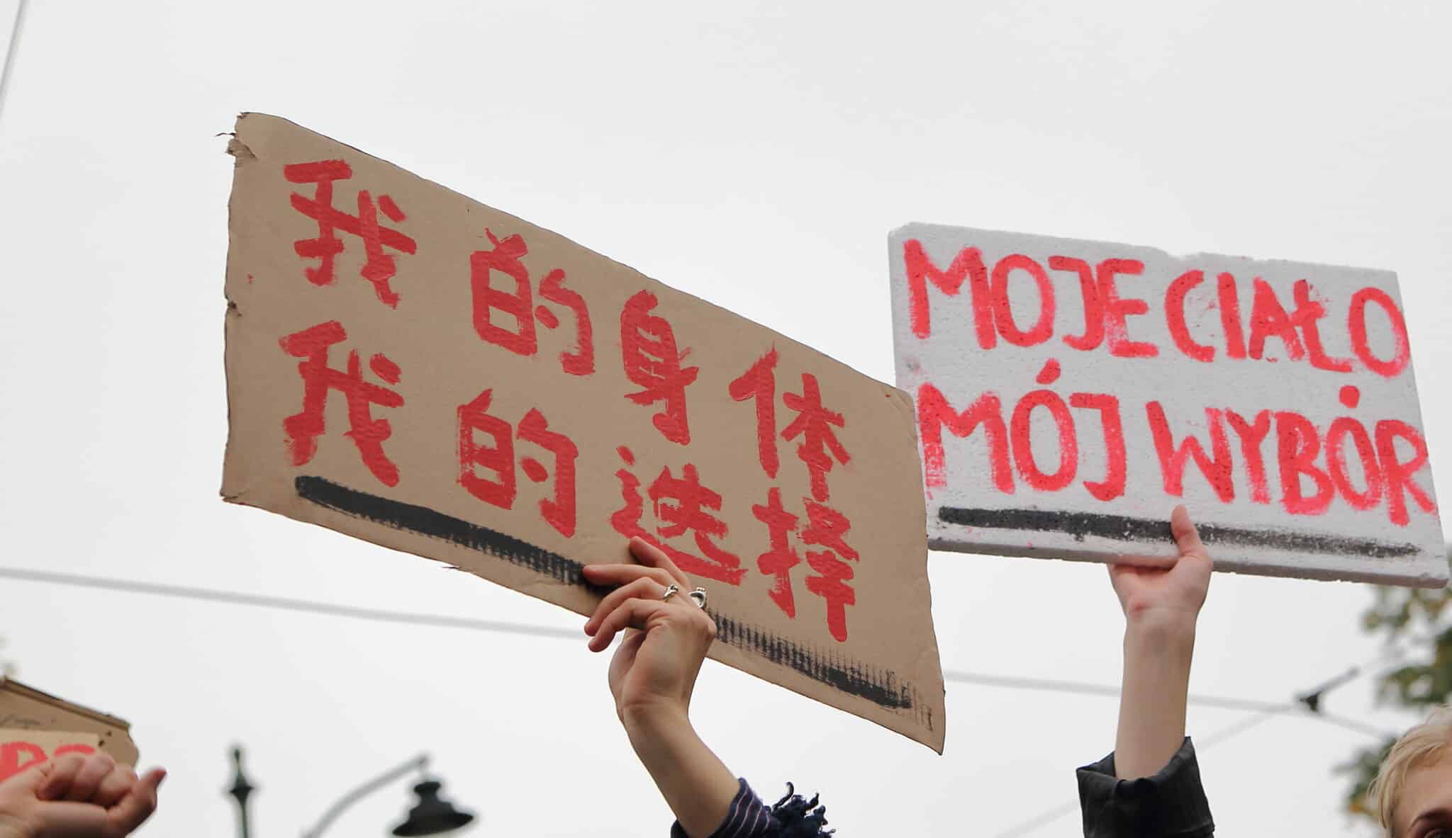 "my body my choice" in polish and mandarin to protest poland abortion laws